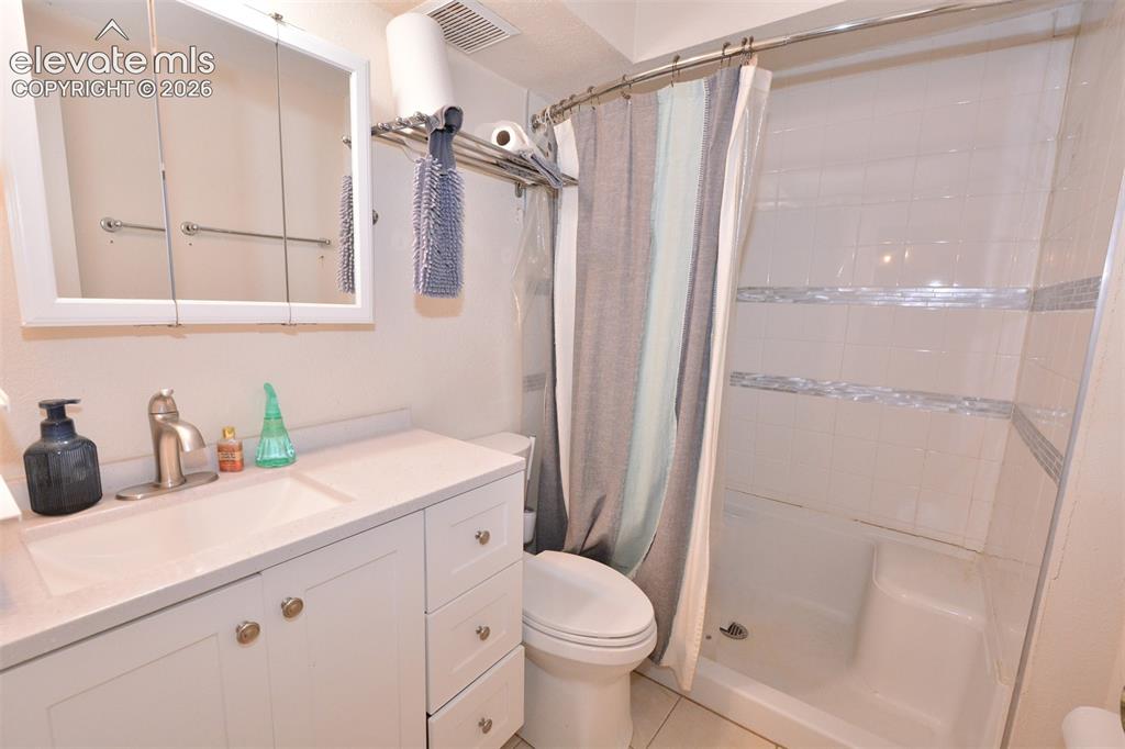 Image 18 of 24: 3/4 bath in basement