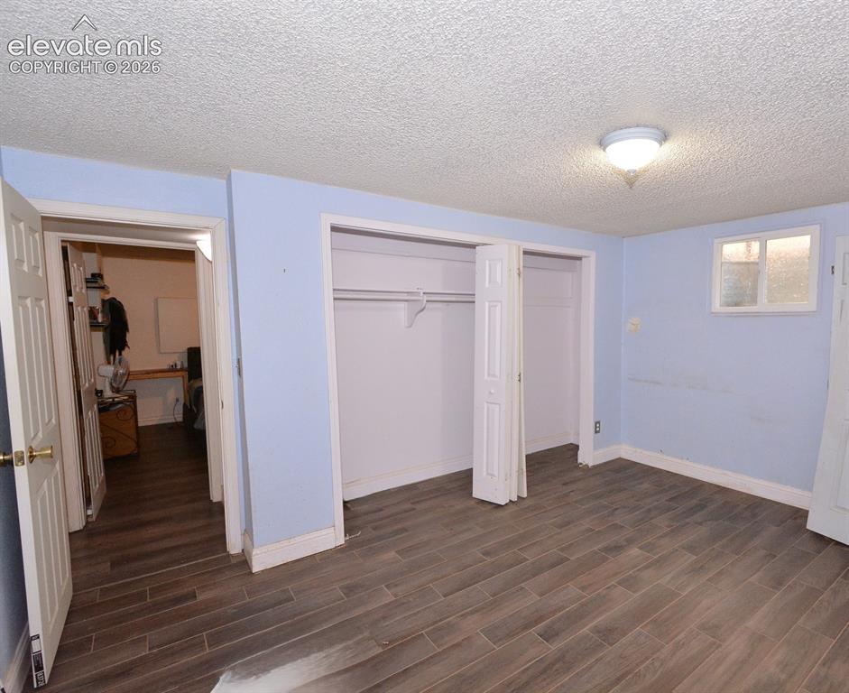 Image 19 of 24: Bedroom in basement