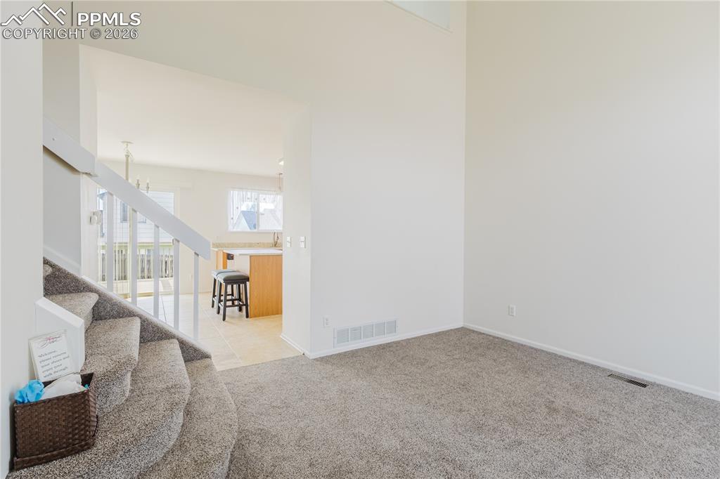 Image 10 of 42: New Tile Flooring, Double Quartz Vanity, Lighting and Fixtures