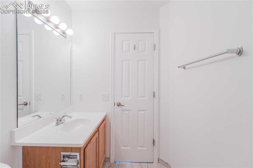 Image 32 of 42: This room features light-colored walls and plush carpeting, creating a neut