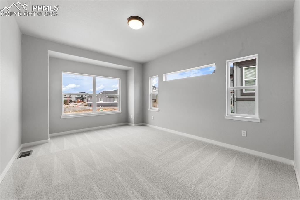 Image 10 of 18: Master Bedroom