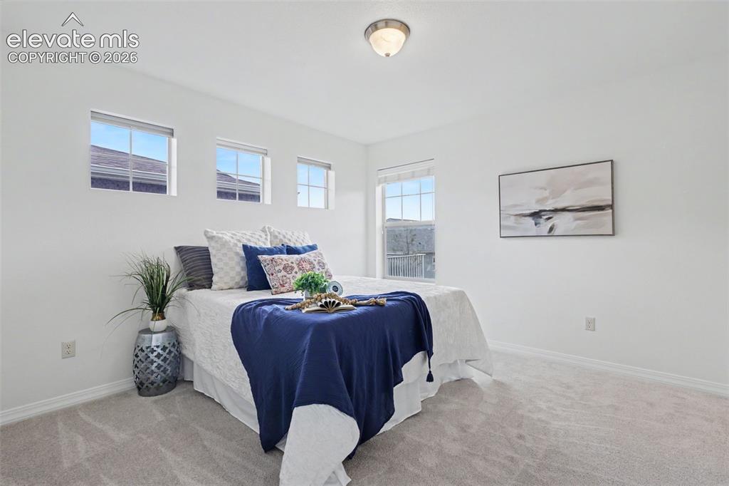 Image 19 of 36: Upper level bedroom