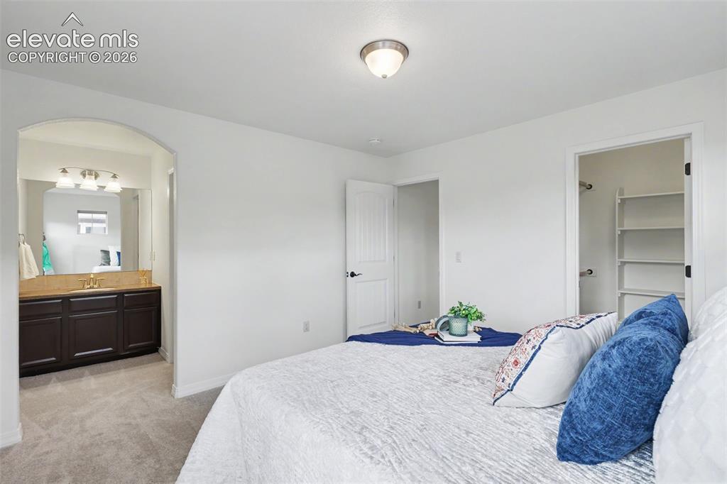 Image 20 of 36: Upper level bedroom