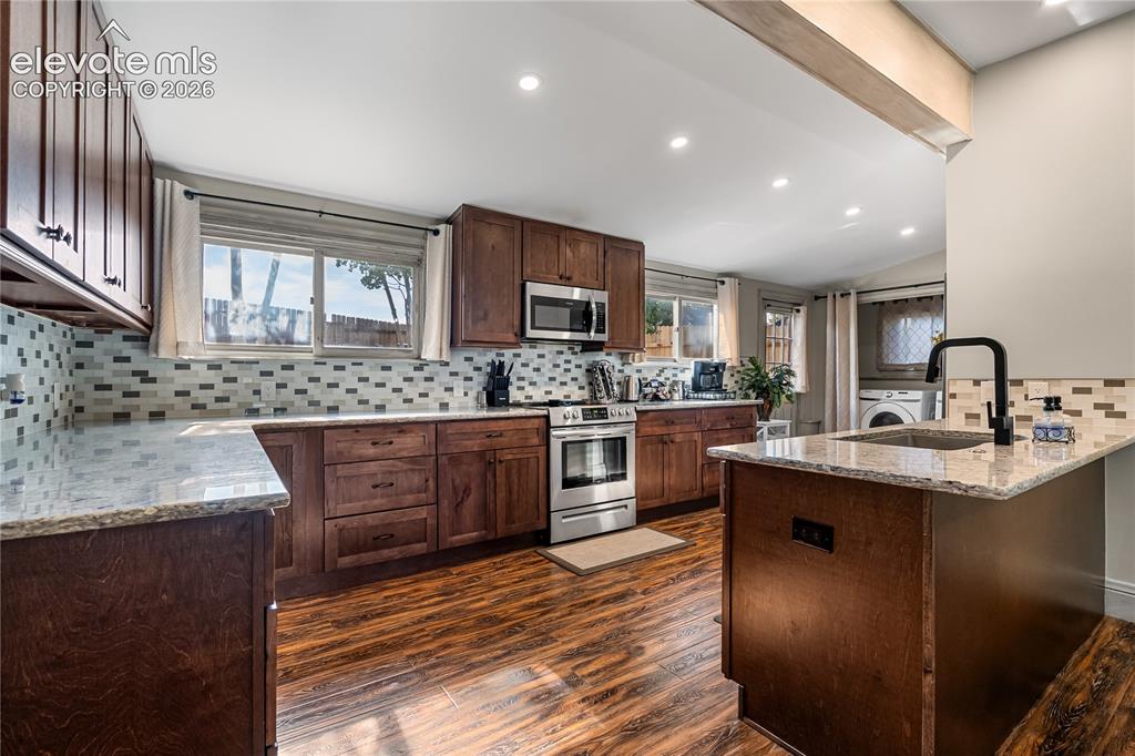 Image 5 of 50: Living Space & Garage Floor Plan