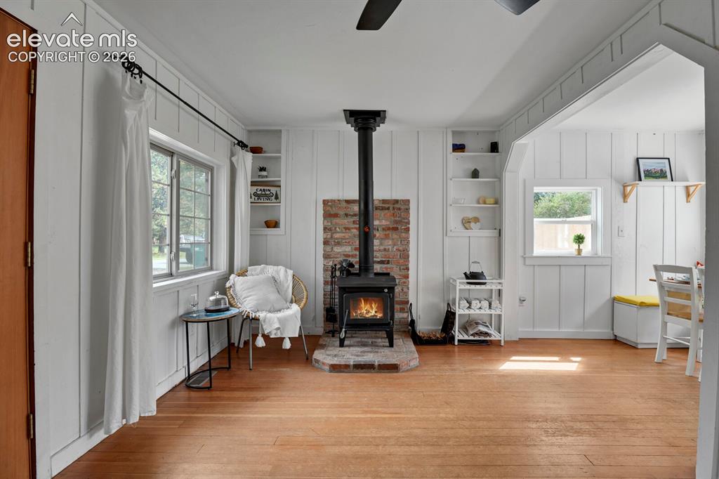 Image 10 of 43: Cozy wood burning stove/fireplace