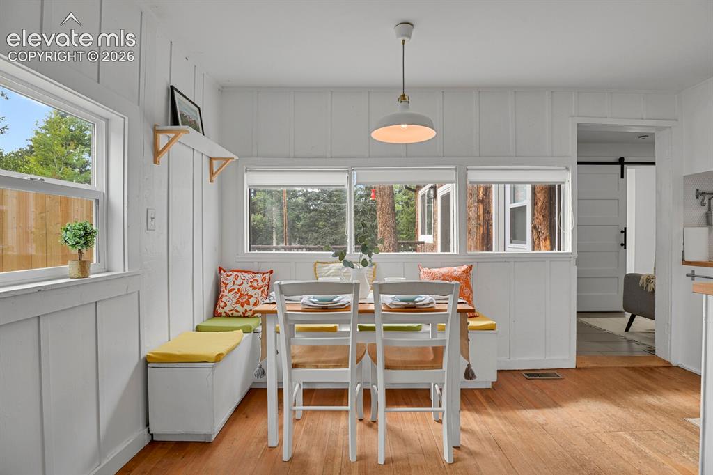 Image 11 of 43: Built in seating with storage