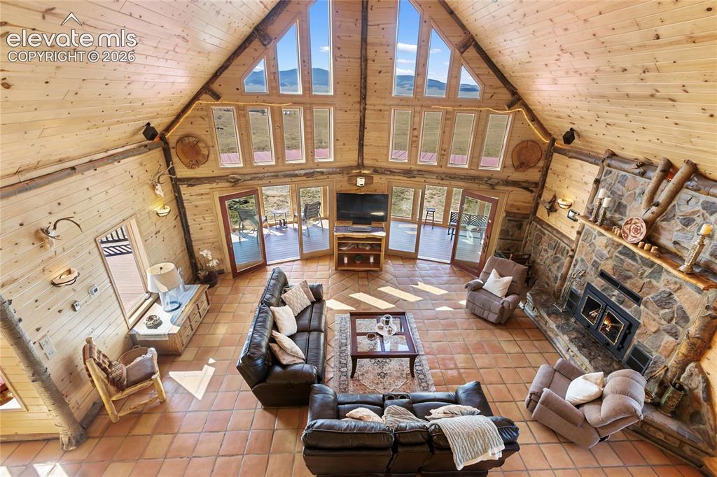Image 14 of 50: 28 foot ceiling