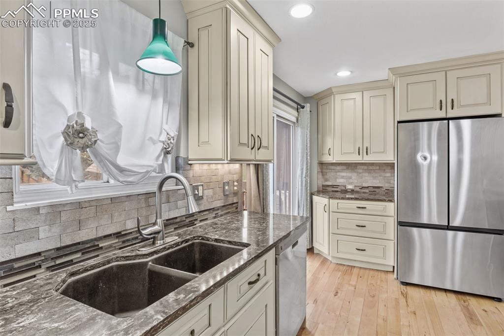 Image 11 of 34: Window over the sink as you stare out into nature while cleaning up after t