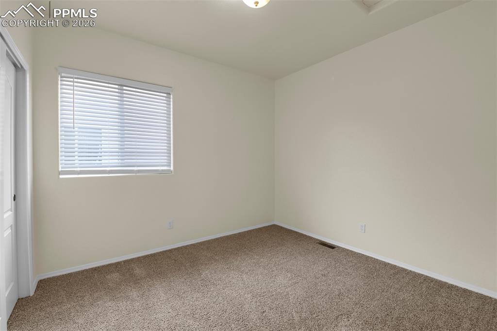 Image 25 of 49: Bedroom