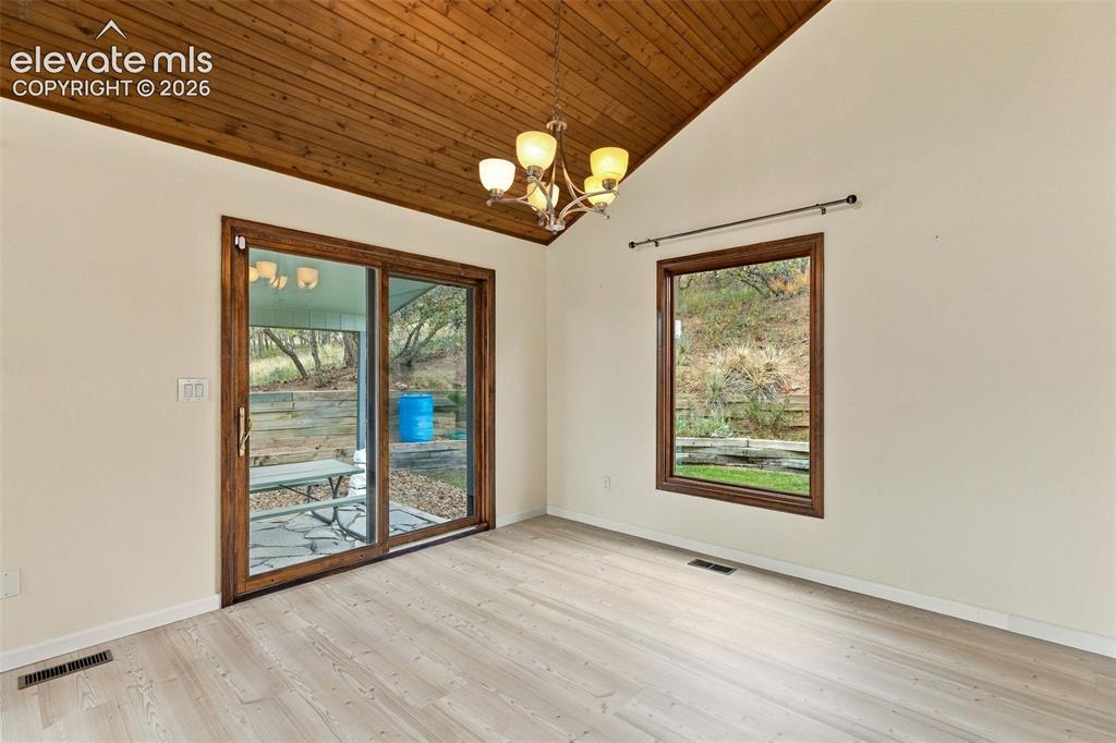 Image 10 of 49: Formal dining or sitting room.