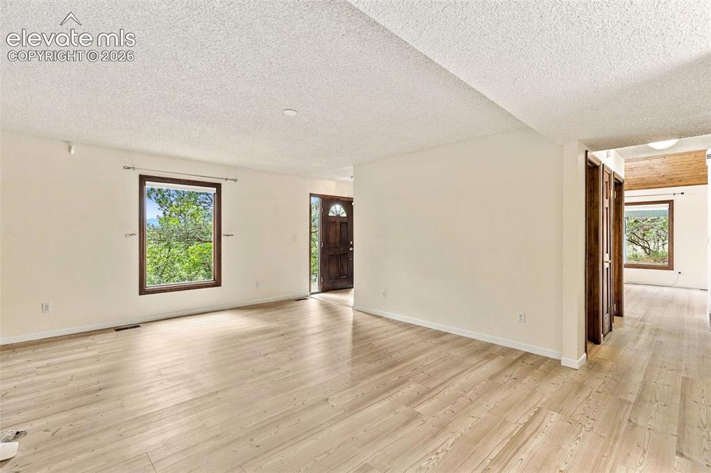 Image 19 of 49: Main level family room.