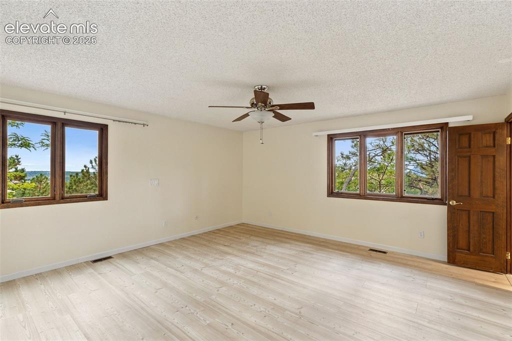 Image 22 of 49: Spacious primary bedroom.