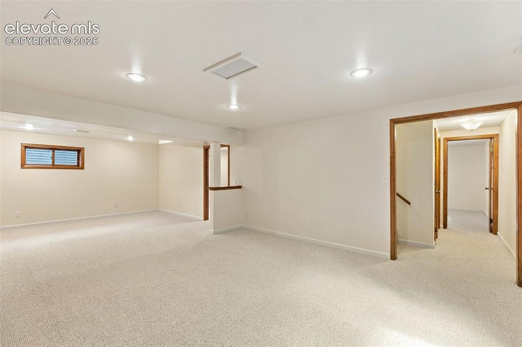 Image 32 of 49: Basement rec room.