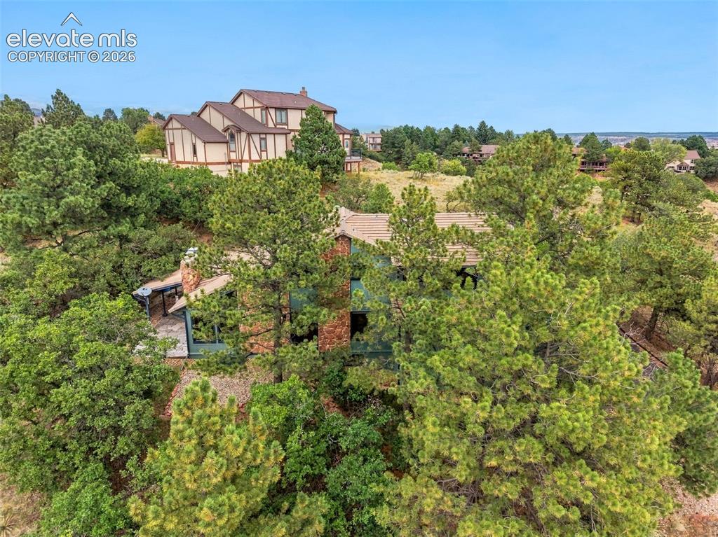 Image 39 of 49: Tucked into the trees for a beautiful setting and privacy.