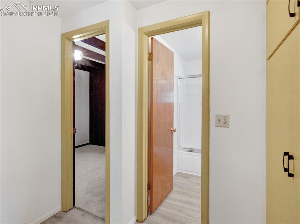 Image 12 of 49: Hall way between the 2 bedrooms