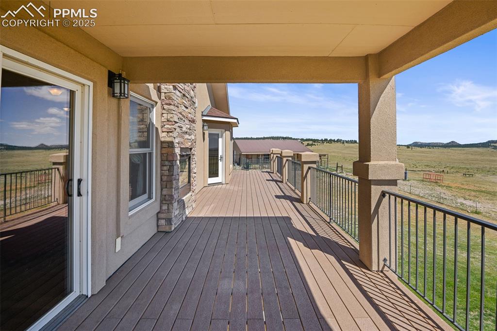 Image 15 of 50: walkout deck from dining room and primary bedroom