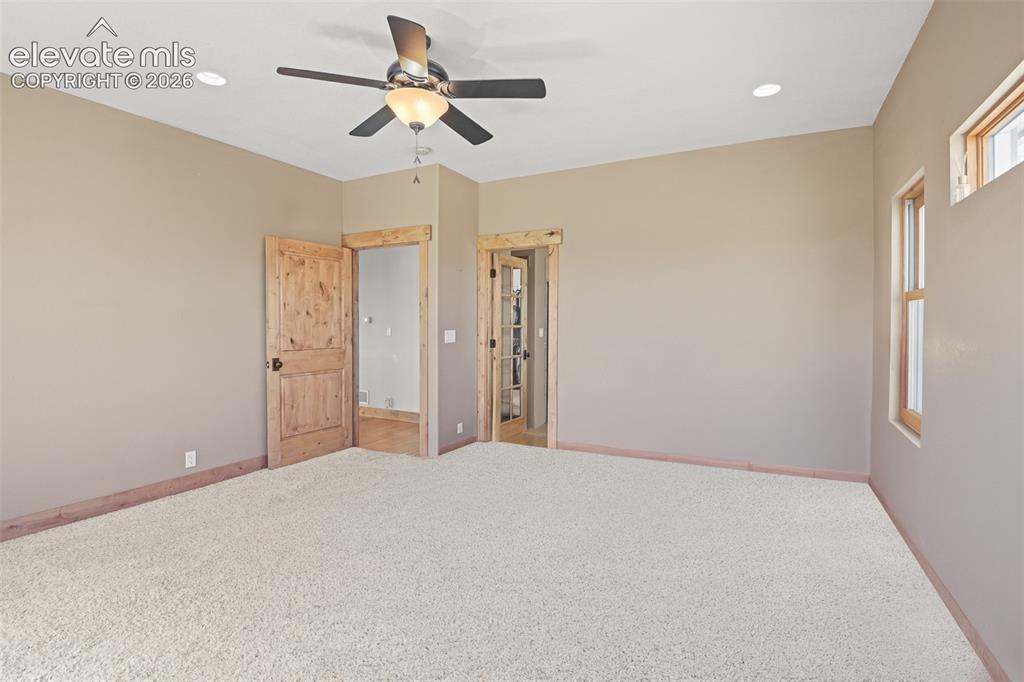 Image 20 of 50: Master Bedroom