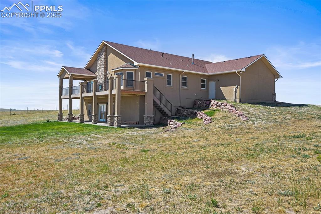 Image 41 of 50: view of the home standing from the west side of the structure