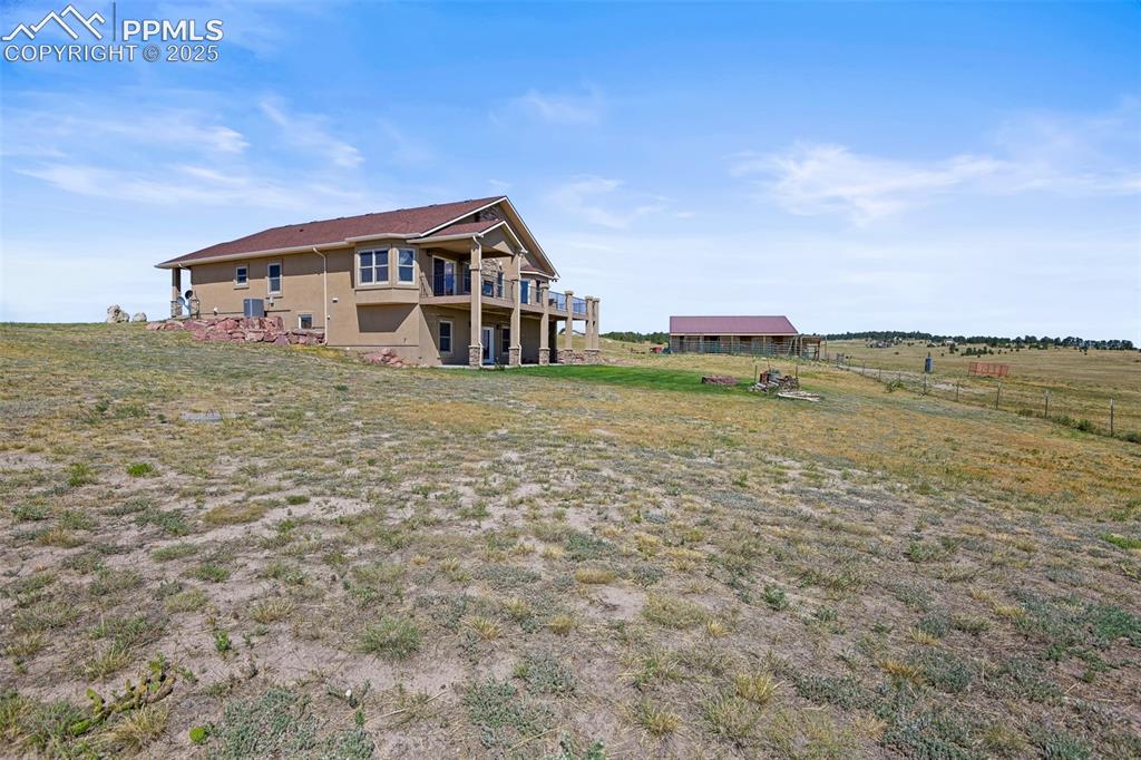 Image 42 of 50: view of the home standing from the east side of the structure