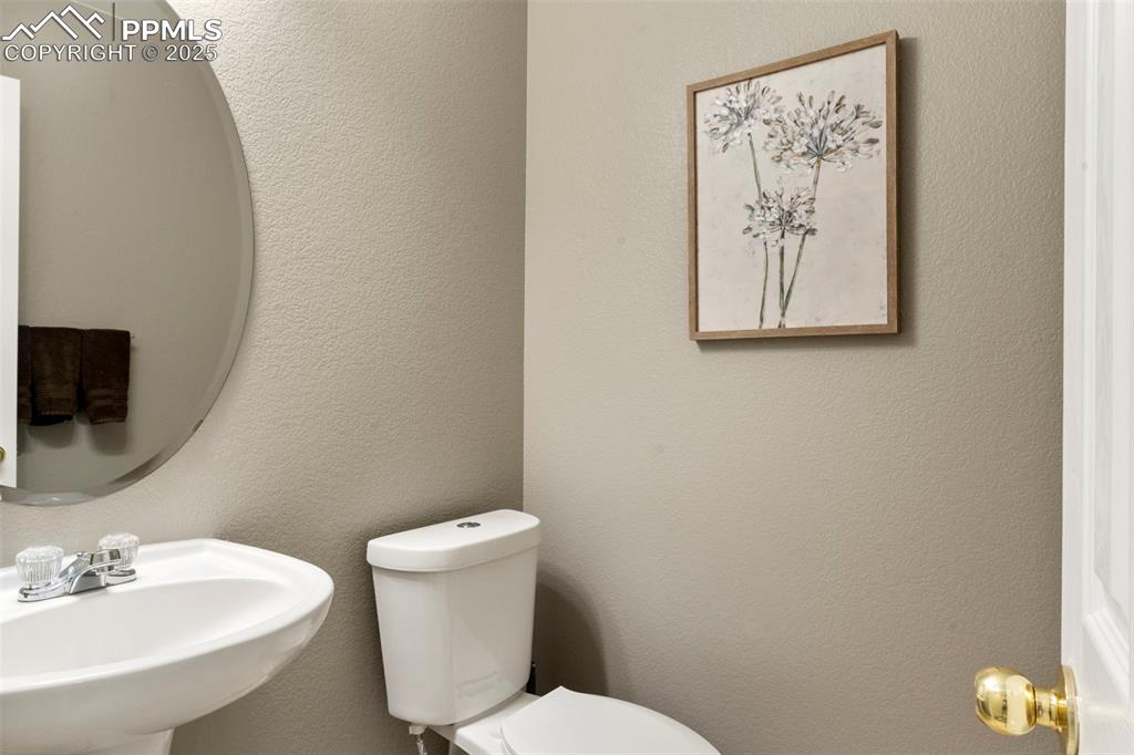 Image 19 of 38: Half bath on main floor 
