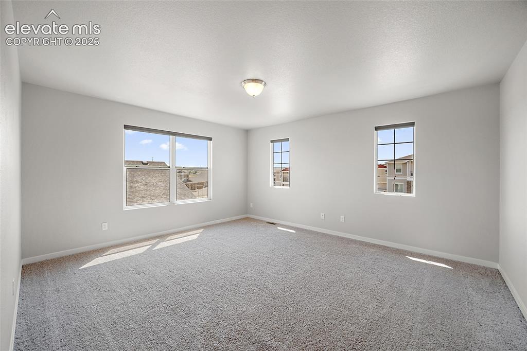 Image 16 of 48: Huge upper level loft with mountain views.