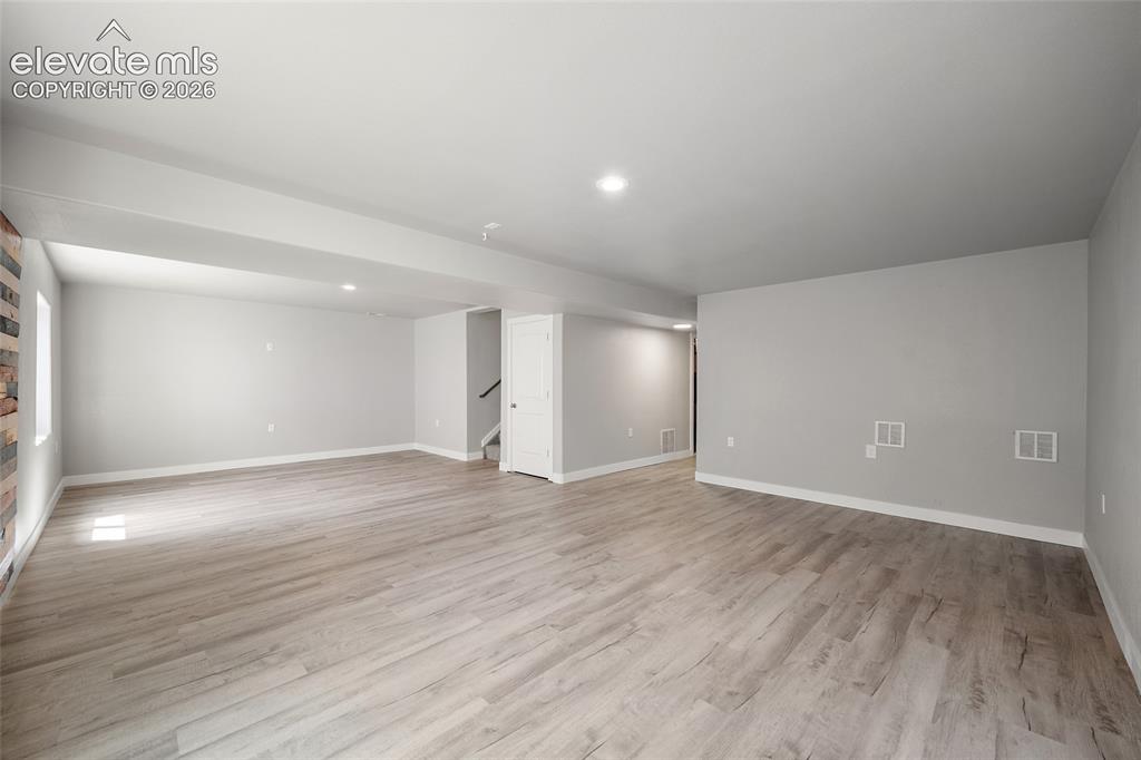 Image 33 of 48: Lower level family room.