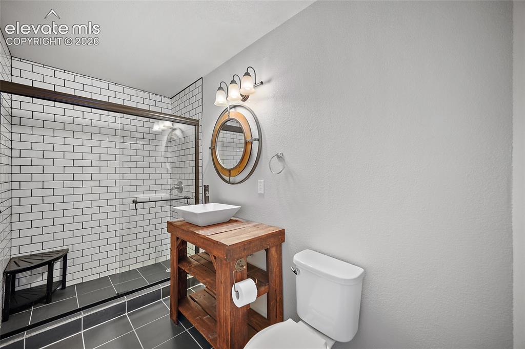 Image 36 of 48: Lower level bathroom.