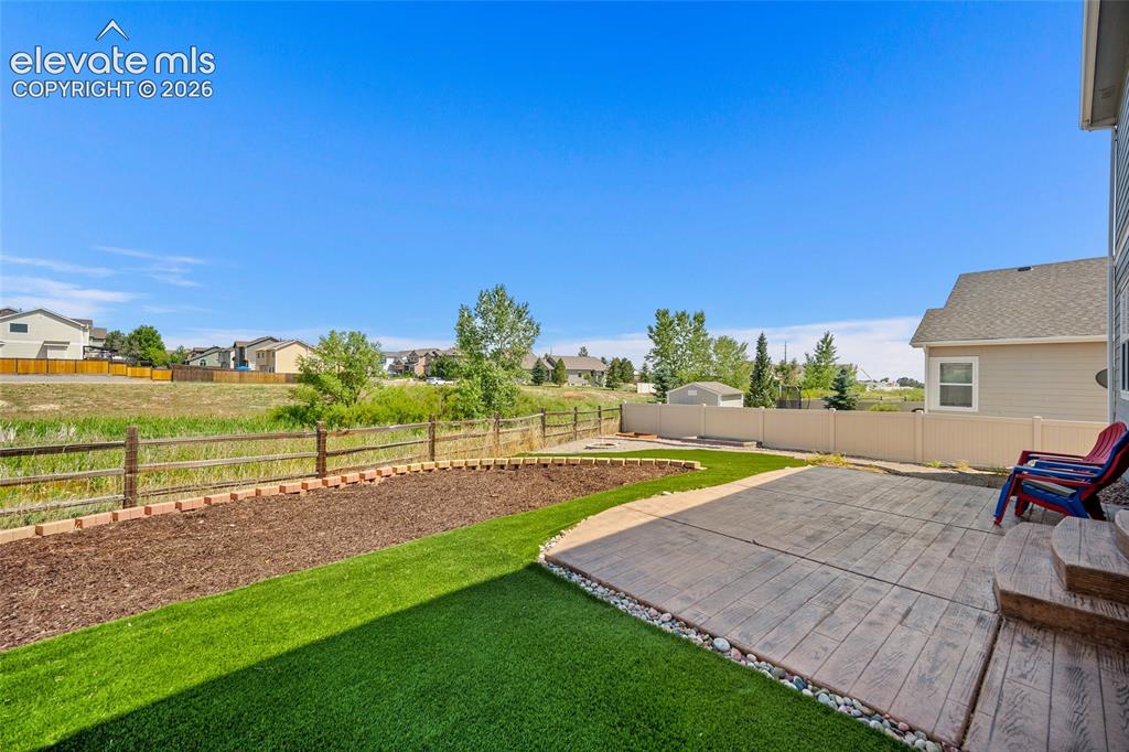 Image 40 of 48: Xeriscape backyard.
