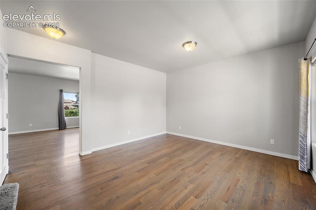Image 6 of 48: Main level living room.
