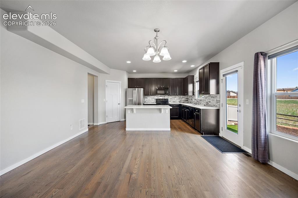 Image 8 of 48: Beautifully finished hardwood floors.