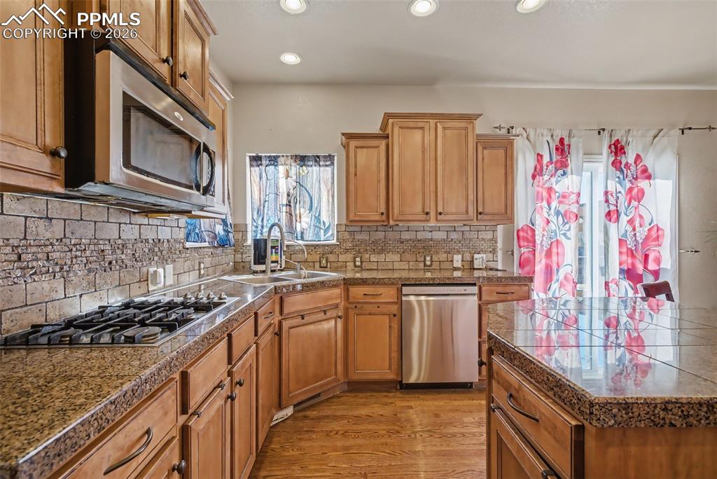 Image 17 of 49: Tons of cabinets and counter space 
