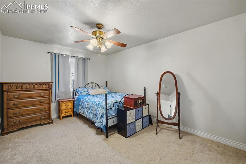 Image 41 of 49: Basement Bedroom