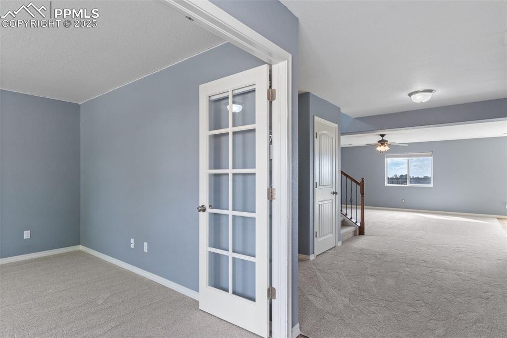 Image 12 of 33: French doors to an office or study