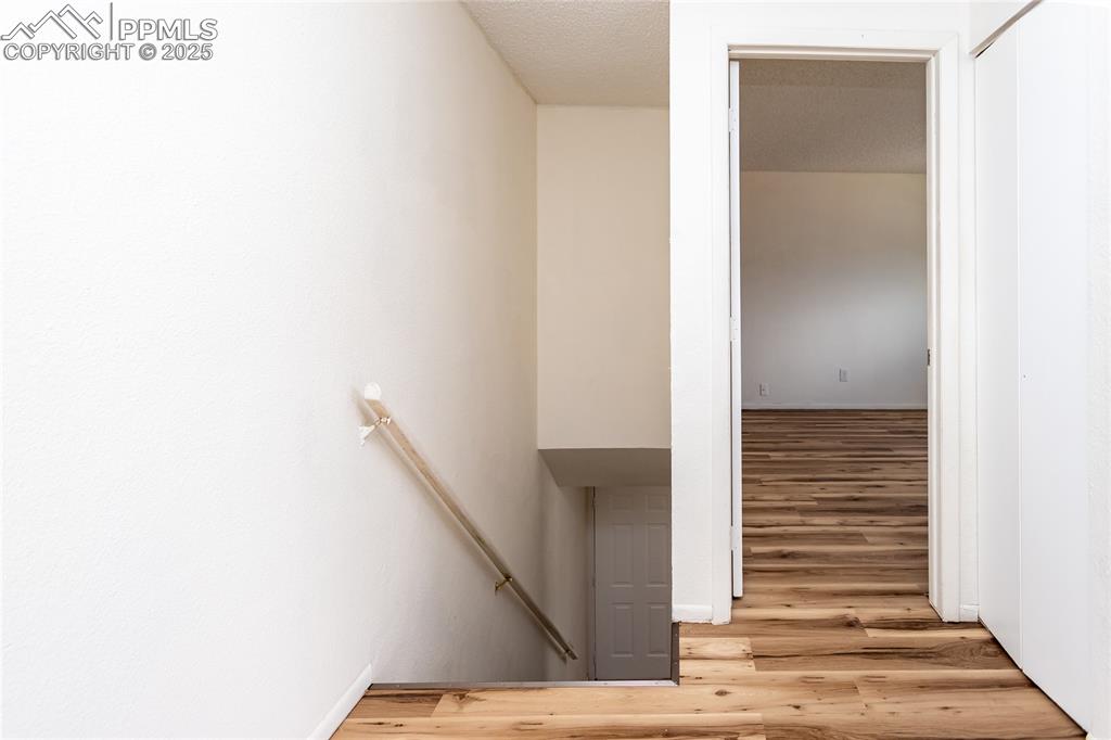 Image 14 of 27: Linen closet is located next to the primary bedroom.
