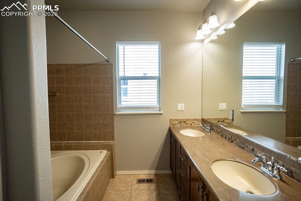 Image 23 of 49: Master Bathroom