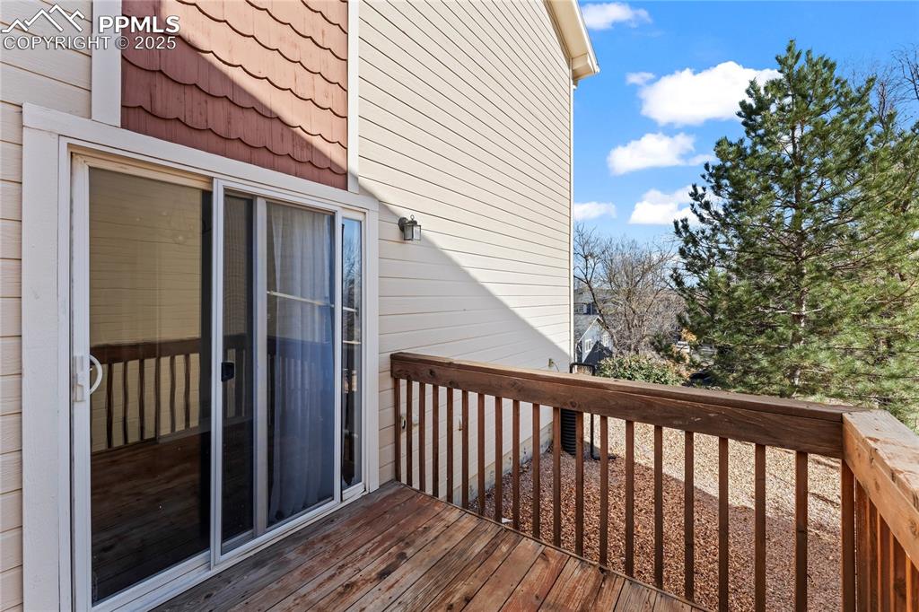 Image 10 of 22: Sliding glass door to deck