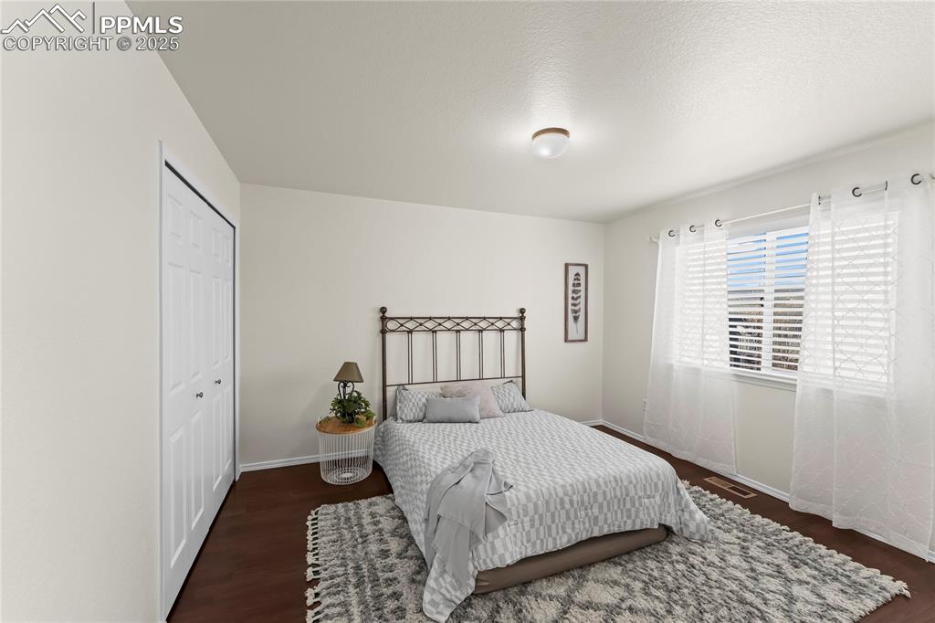 Image 12 of 22: Primary bedroom on main level