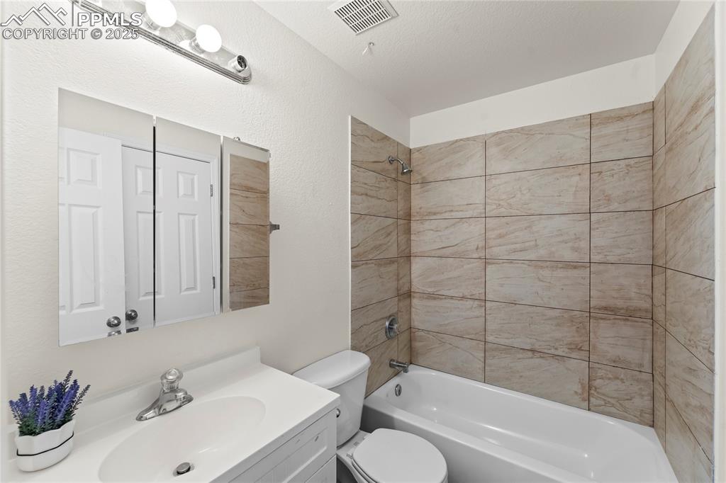 Image 14 of 22: Bathroom on main