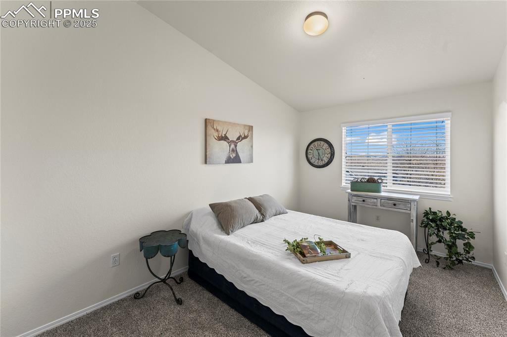 Image 20 of 22: Upper second bedroom