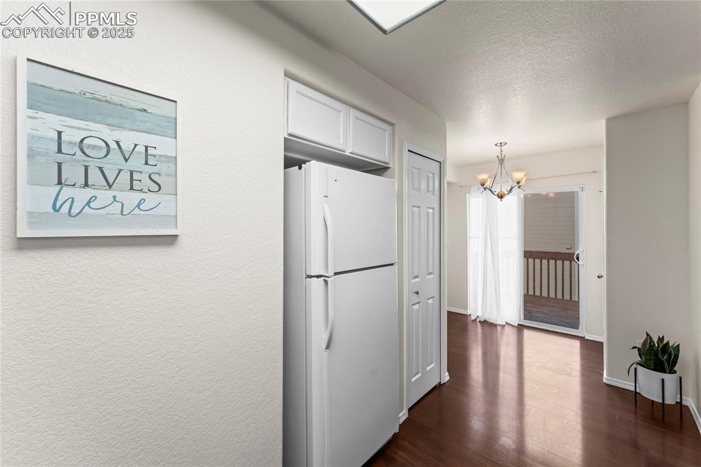 Image 8 of 22: Pantry, dining room and walk out.