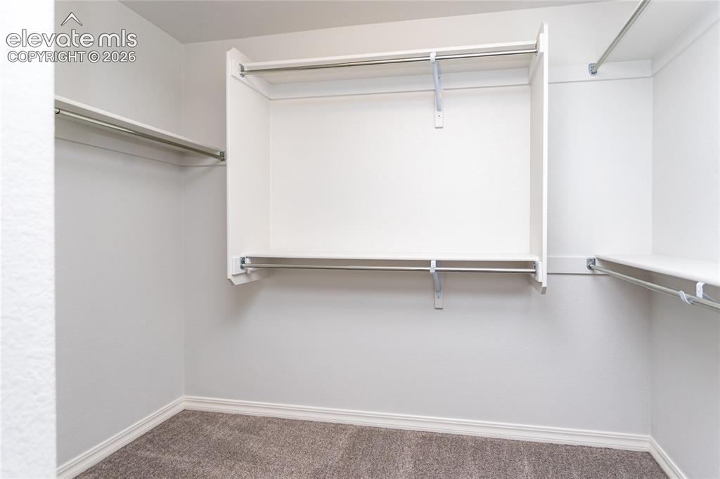 Image 20 of 43: Walk in closet