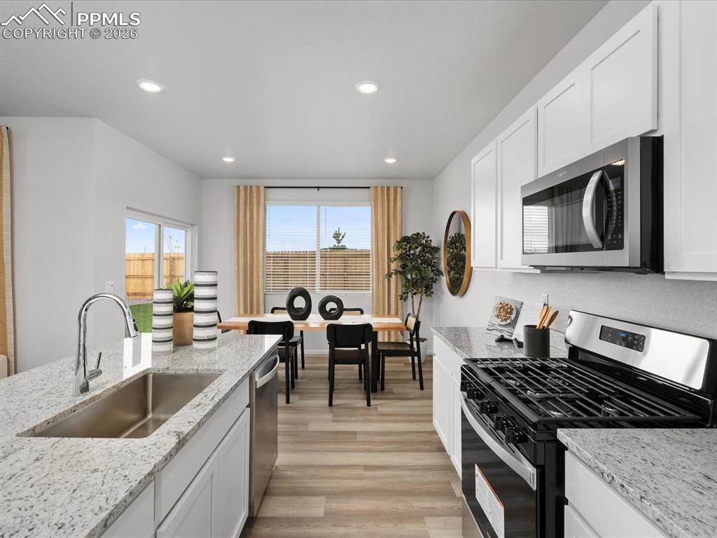 Image 11 of 28: This was a model home; any furniture is not included.