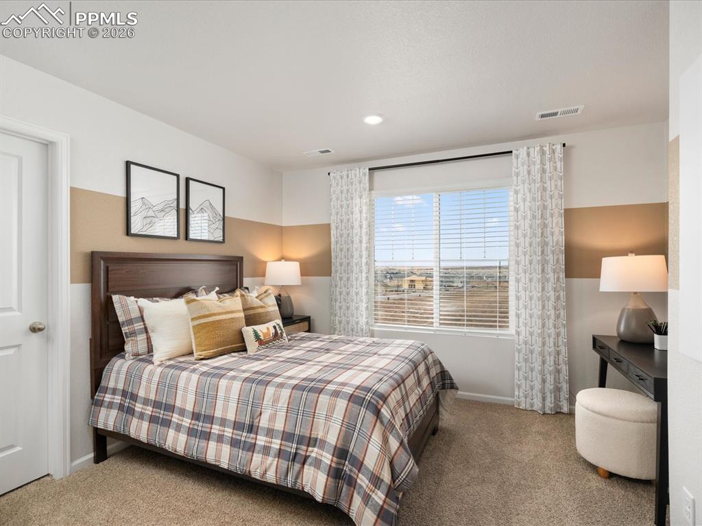 Image 21 of 28: This was a model home; any furniture is not included.