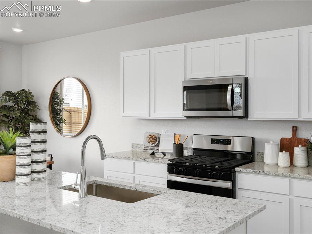 Image 8 of 28: This was a model home; any furniture is not included.