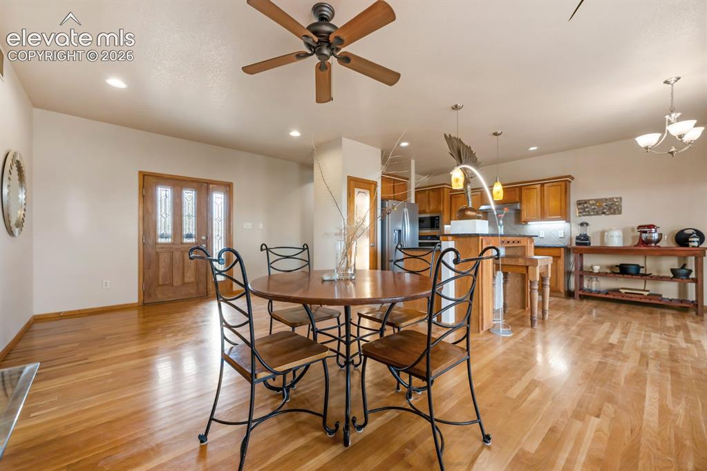 Image 12 of 50: Another view of the main level. Solid hardwood doors through out this cust