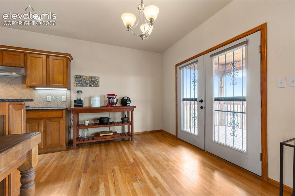 Image 17 of 50: Back of the home faces east.  Perch your living room or morning coffee look