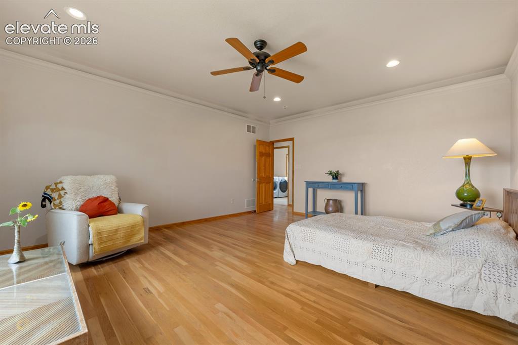 Image 20 of 50: Beautiful hardwoods and room is large at 16x19 .  Multiple ways to situate 