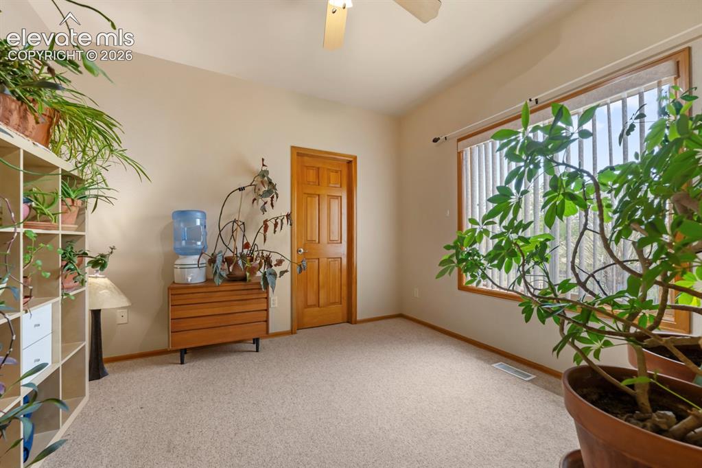 Image 30 of 50: Walk in closets both secondary bedrooms.  This room is drenched in light wi