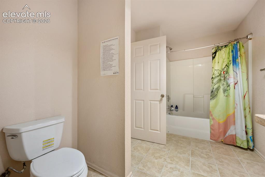Image 35 of 50: Oversized bathroom on the lower level.