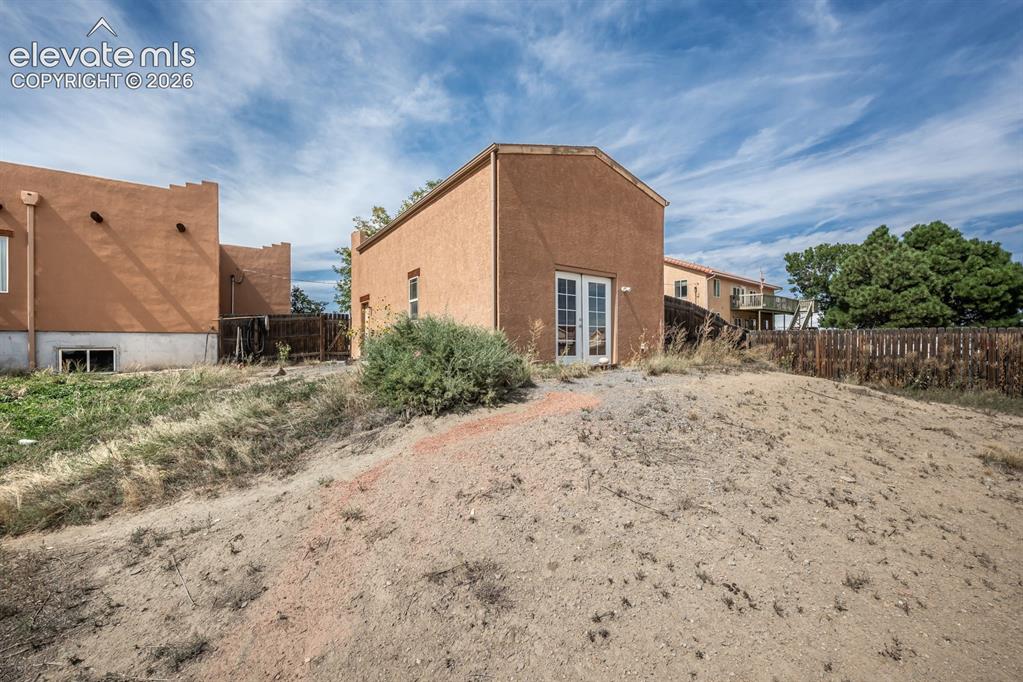Image 43 of 50: 1.4 acres home is fully fenced with 2 areas front and back.